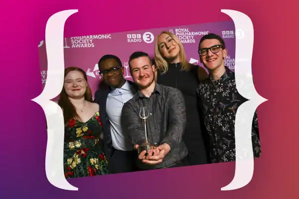 Group photo of Orchestras for All posing with their RPS Impact Award